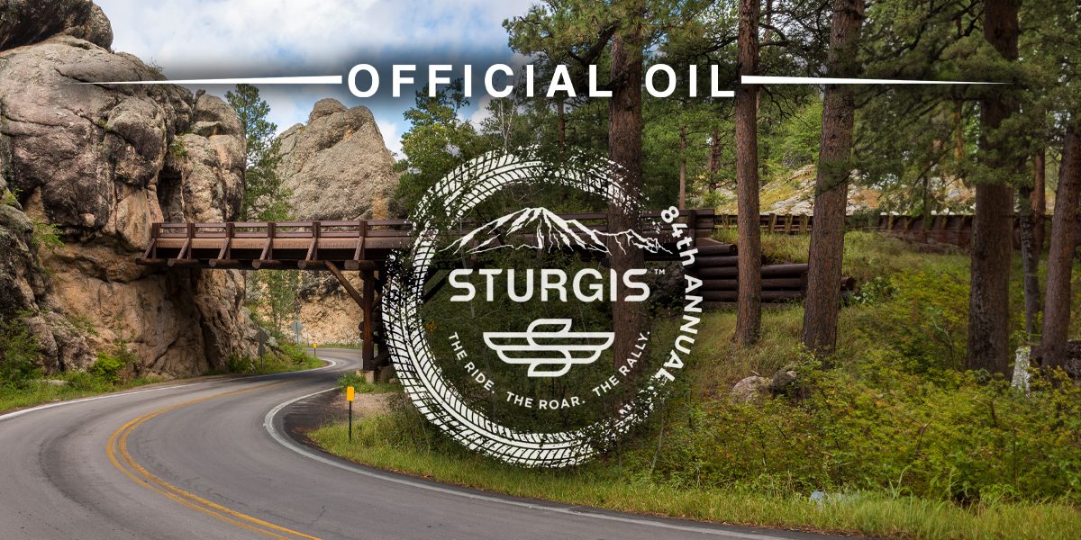 Sturgis logo with senic route in background