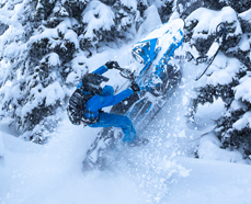 Snowmobile in fresh powder snow