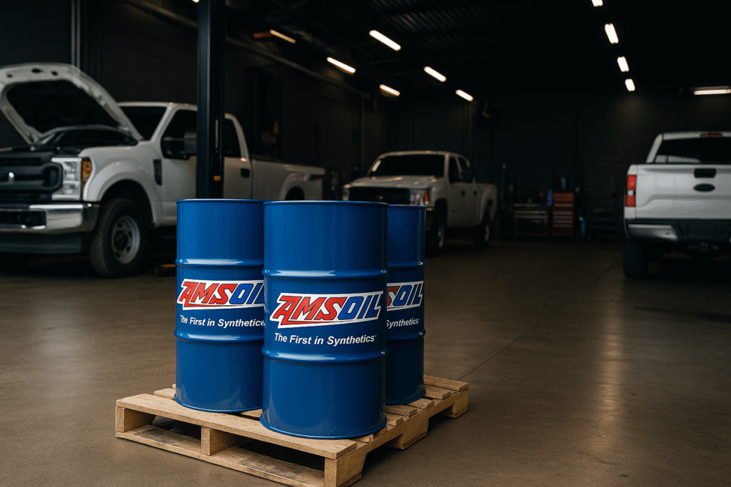 Bulk AMSOIL oil drums delivered to a commercial fleet service garage
