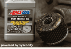 AMSOIL OE 0W-16 synthetic motor oil next to a dirty filter, highlighting its cleaning function